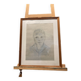 Framed drawing of a boy signed Roy and annotated "Paris 87".