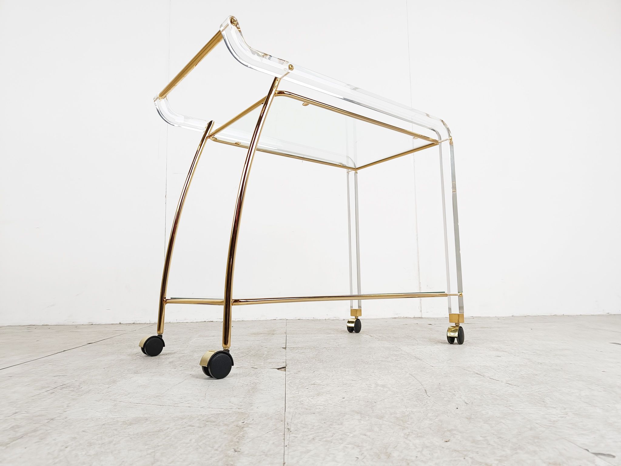 Brass and lucite drinks trolley, 1970s