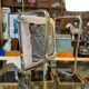 Fauteuil / chauffeuse de salon tissus et chrome Atal 1970