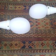 Pair of wall lights from the 1950s in porcelain.