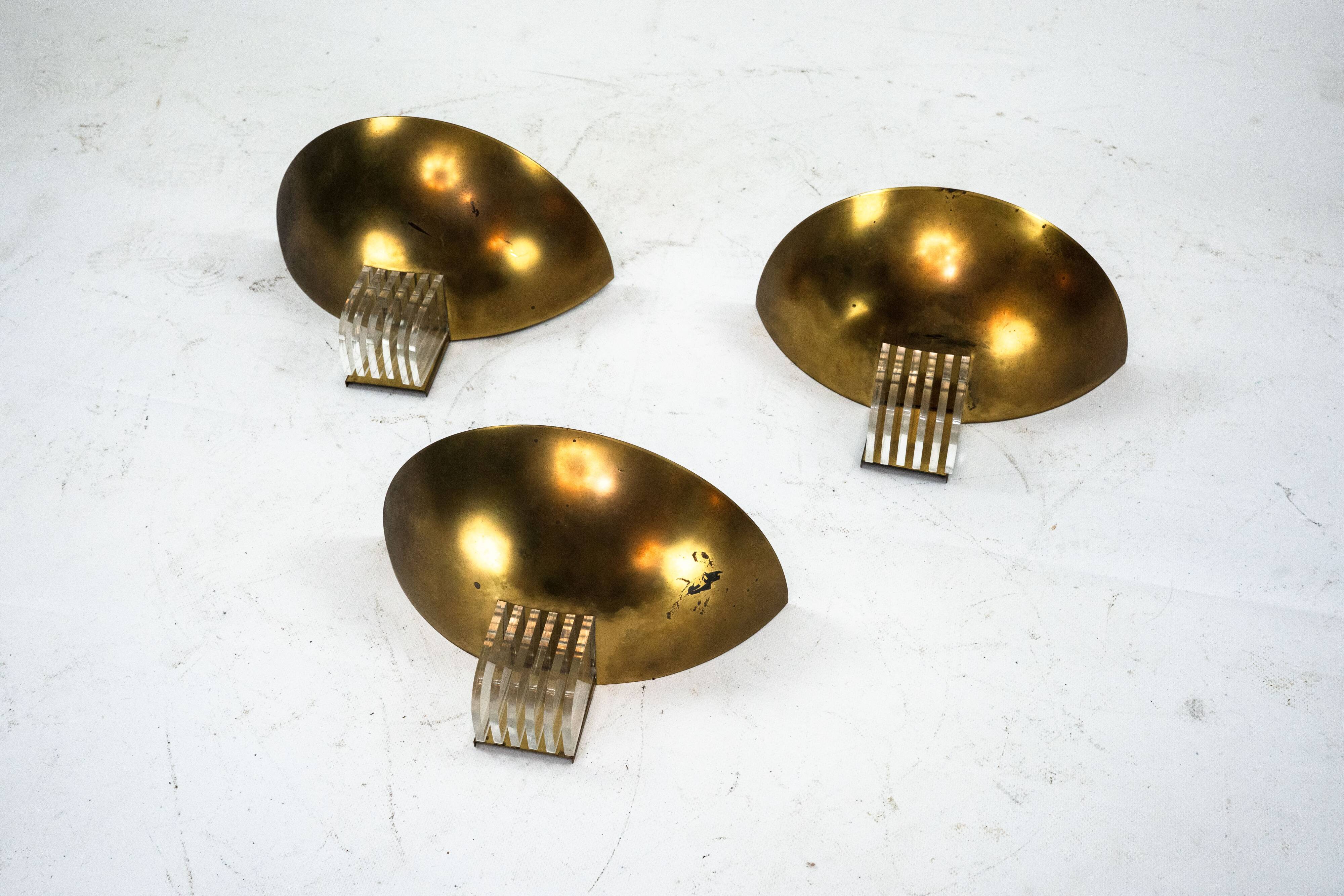 Set of three Italian Deco-style brass wall sconces, Italy 1970s
