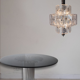 Vintage metal chandelier and carved glass