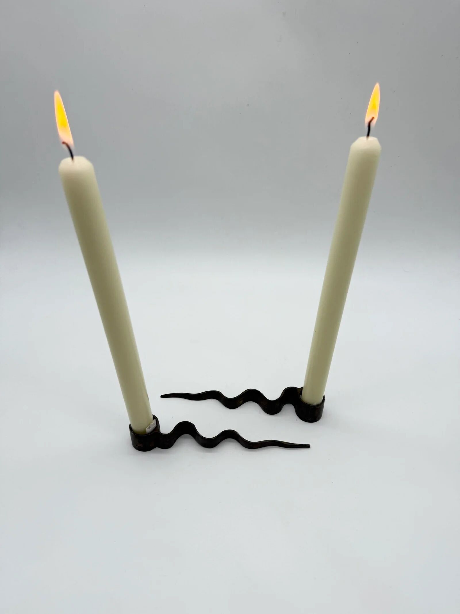 Pair of "Serpentine" candlesticks, modernist, 1970s