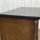 Empire buffet from the early 19th century in mahogany with a black marble top.