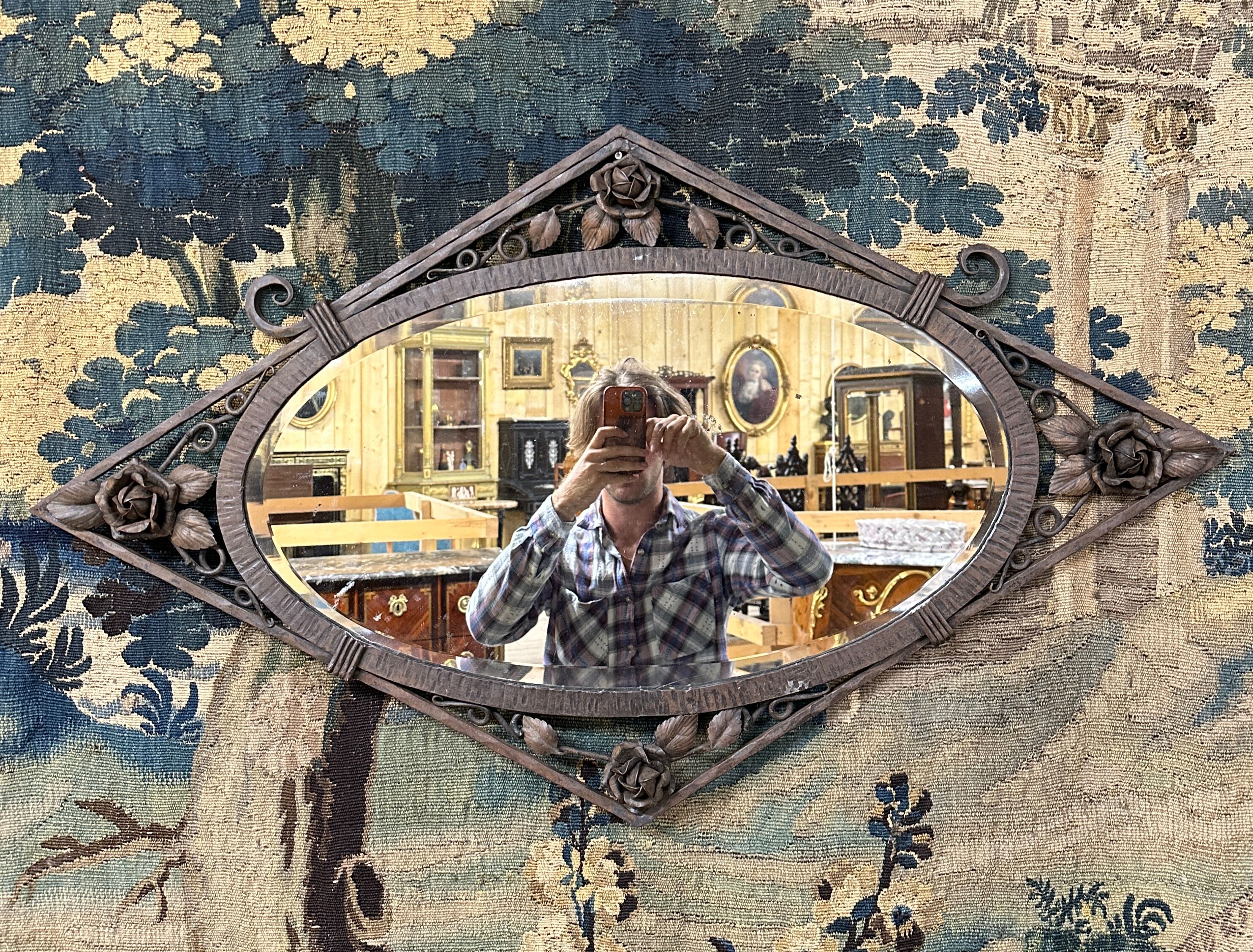 Diamond wall mirror of the art deco period in wrought iron, circa 1920