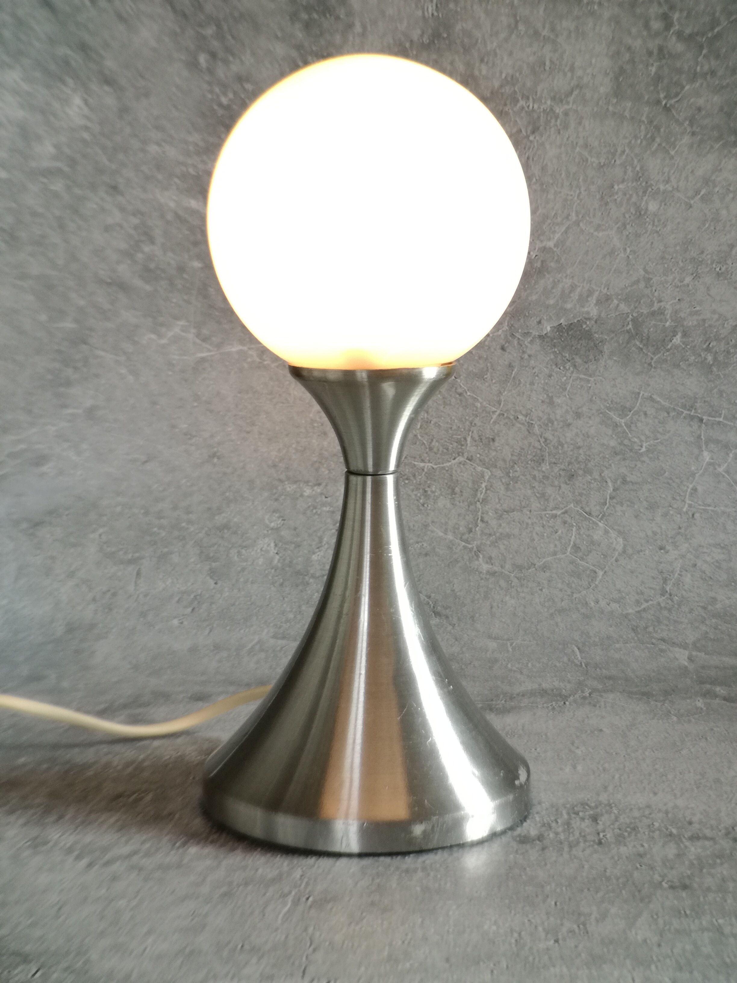 Brushed stainless steel and glass lamp from the 70s