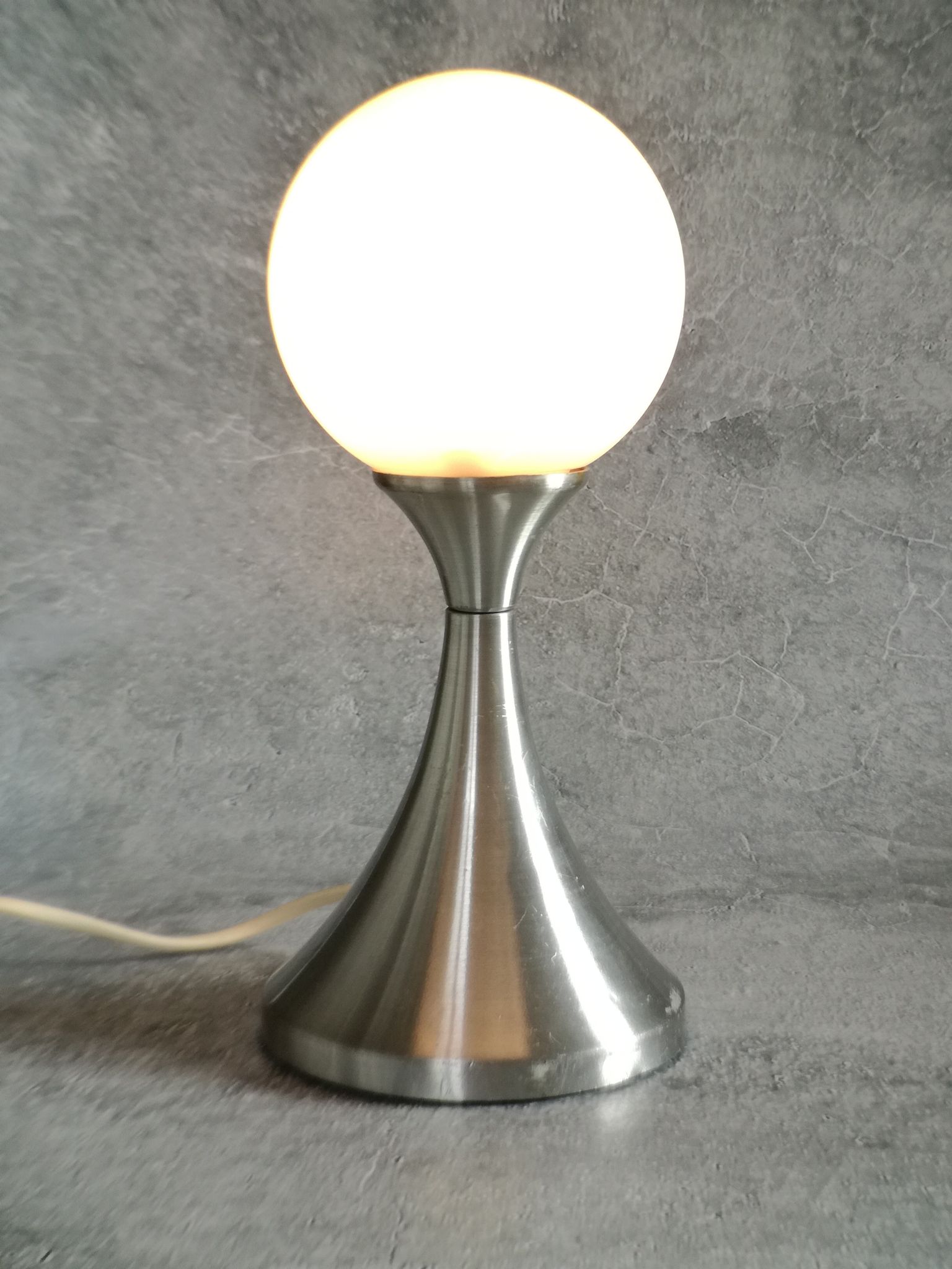 Brushed stainless steel and glass lamp from the 70s