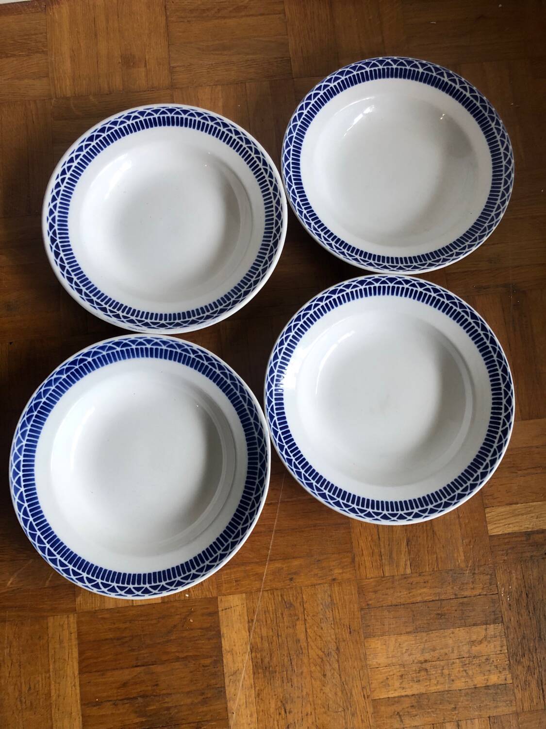 Four vintage Sarguemines soup plates
