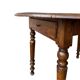 Round (foldable) table in solid wood (walnut)