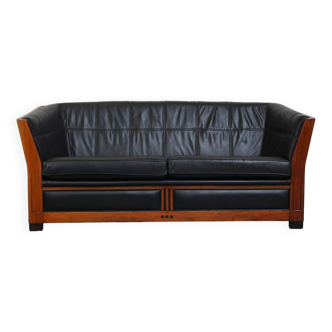 Unique black leather and wooden Art Deco design 2.5-seater sofa with a stunning appearance