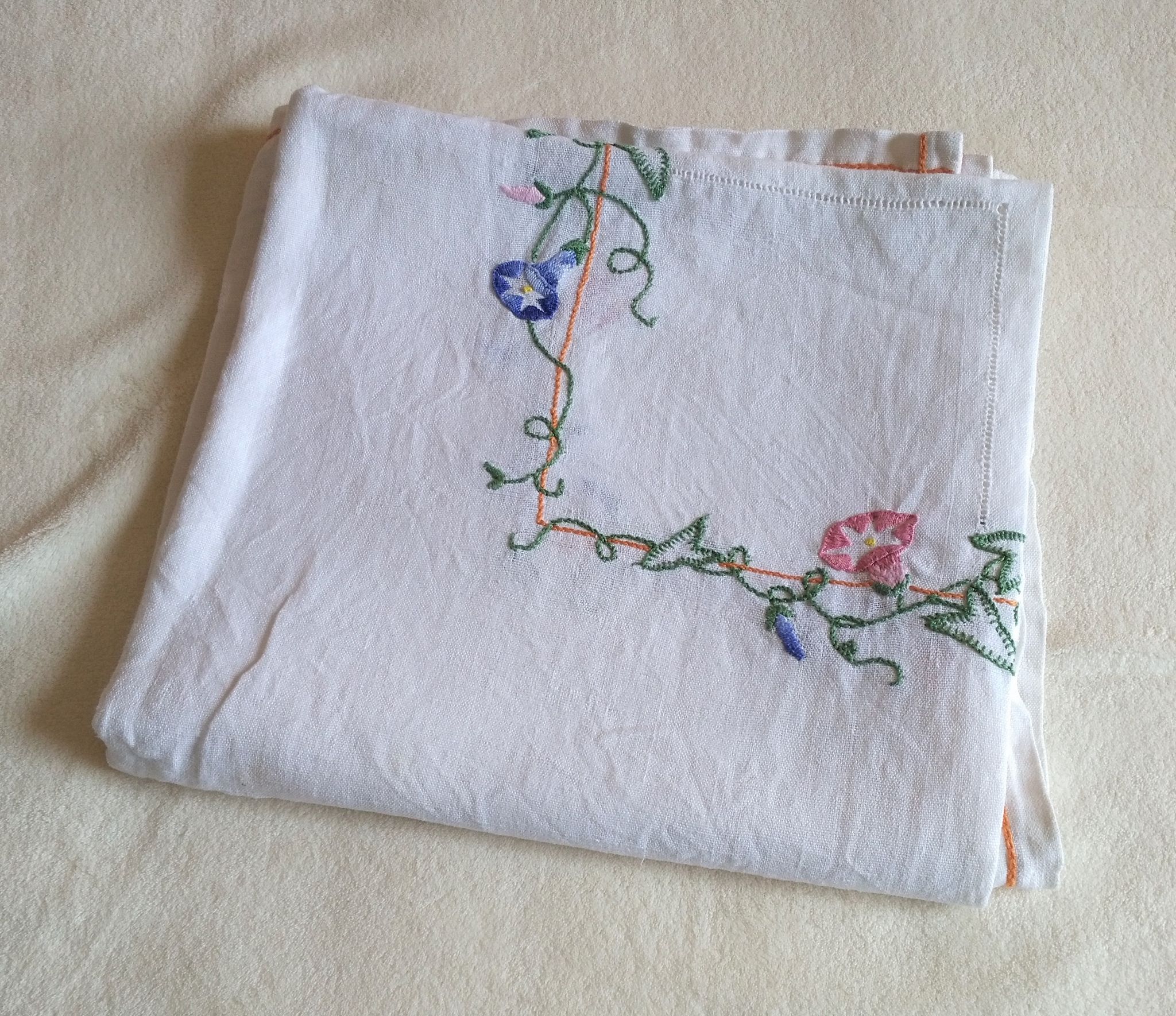 Antique linen tablecloth embroidered with flowers