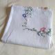 Antique linen tablecloth embroidered with flowers