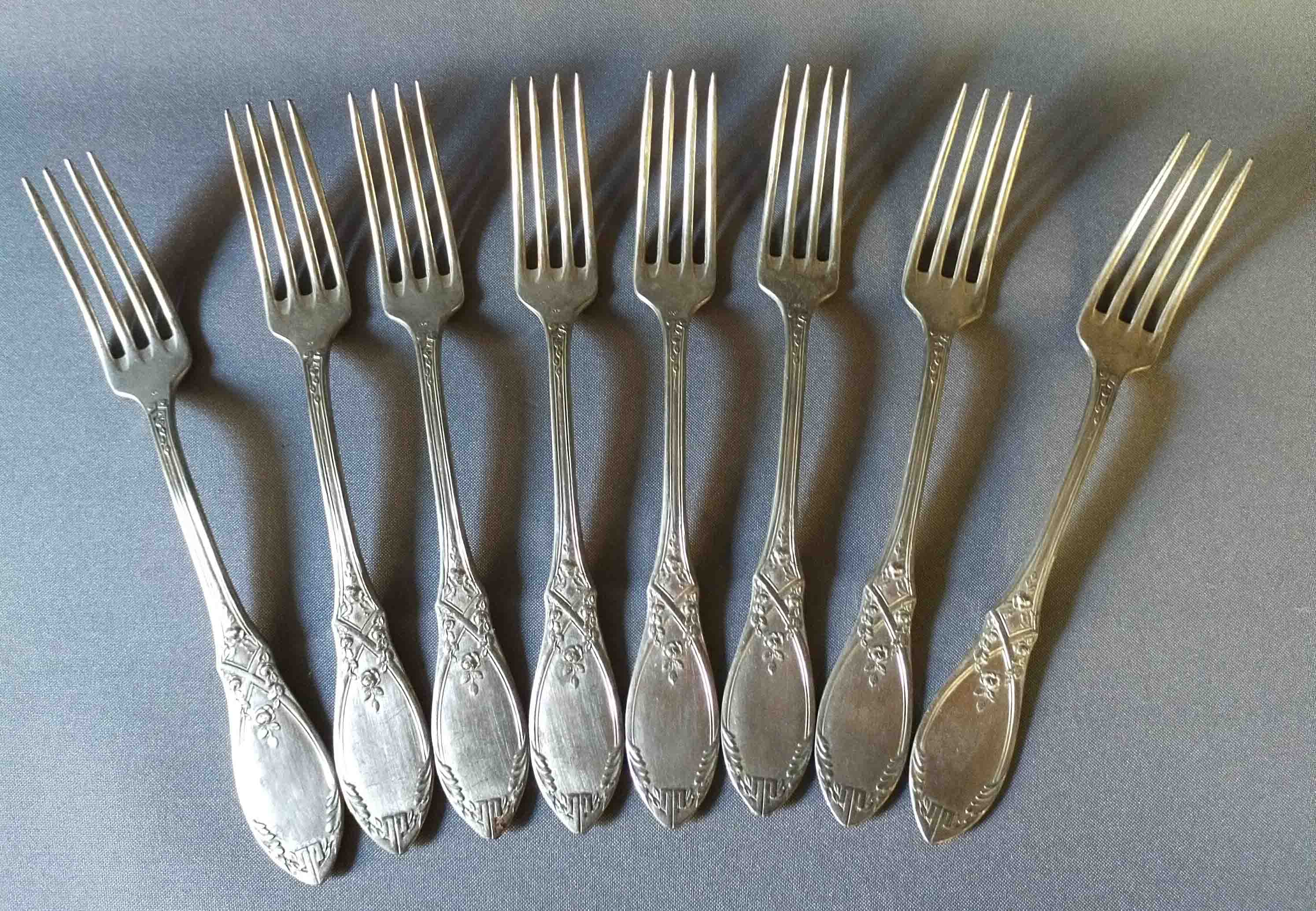 8 silver metal forks