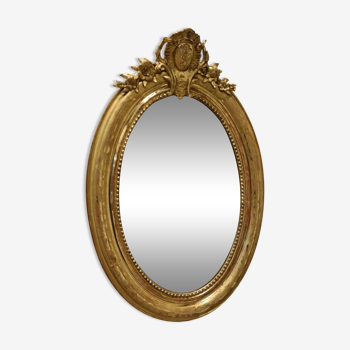 Miroir oval doré biseauté XIXe siècle
