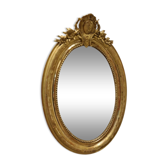 19th century beveled gilded oval mirror