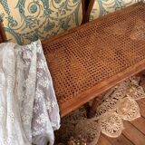 Piano bench seat in cane