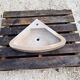 Corner stone sink