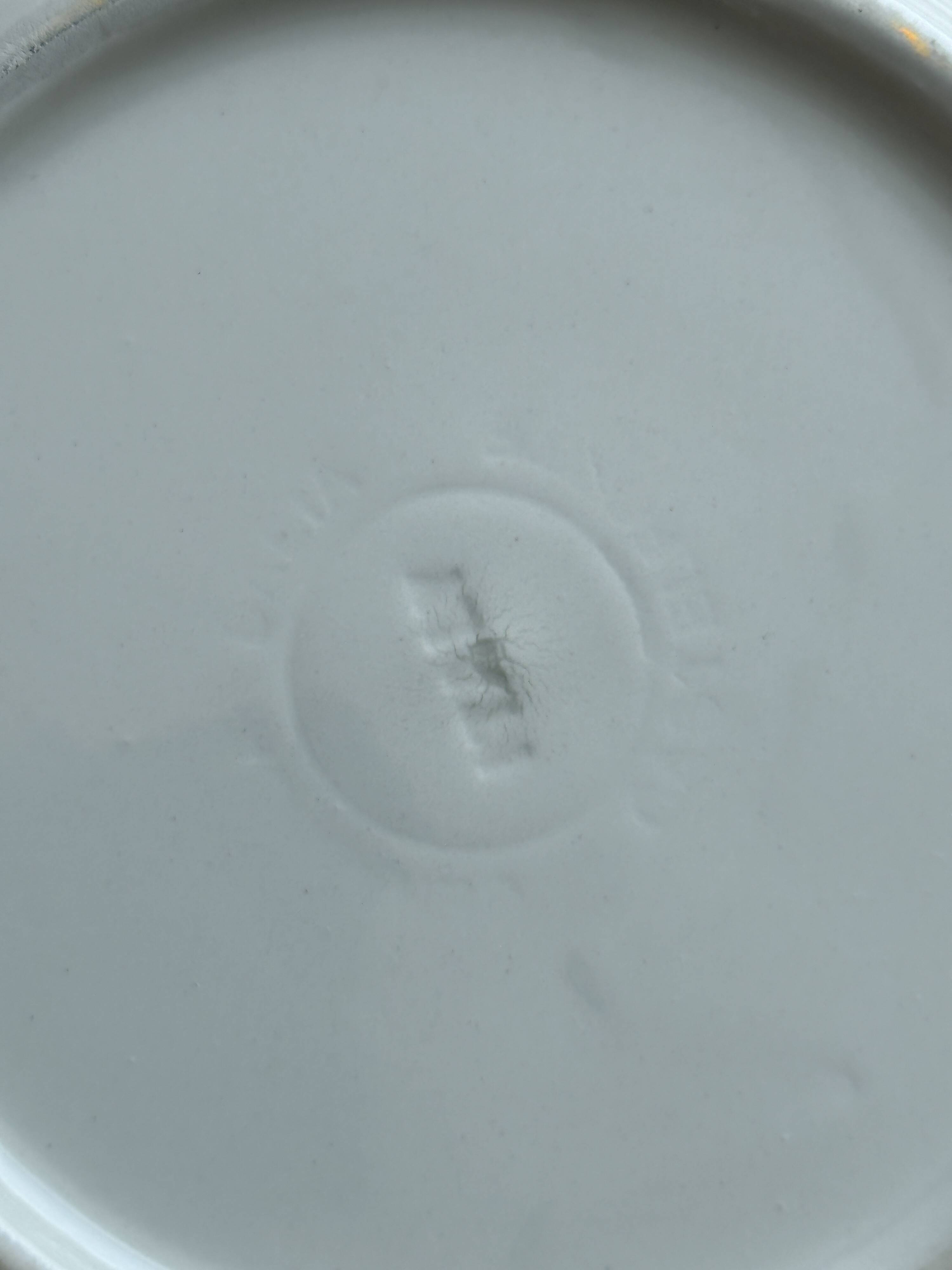 Duo of dessert plates with green and burgundy red border