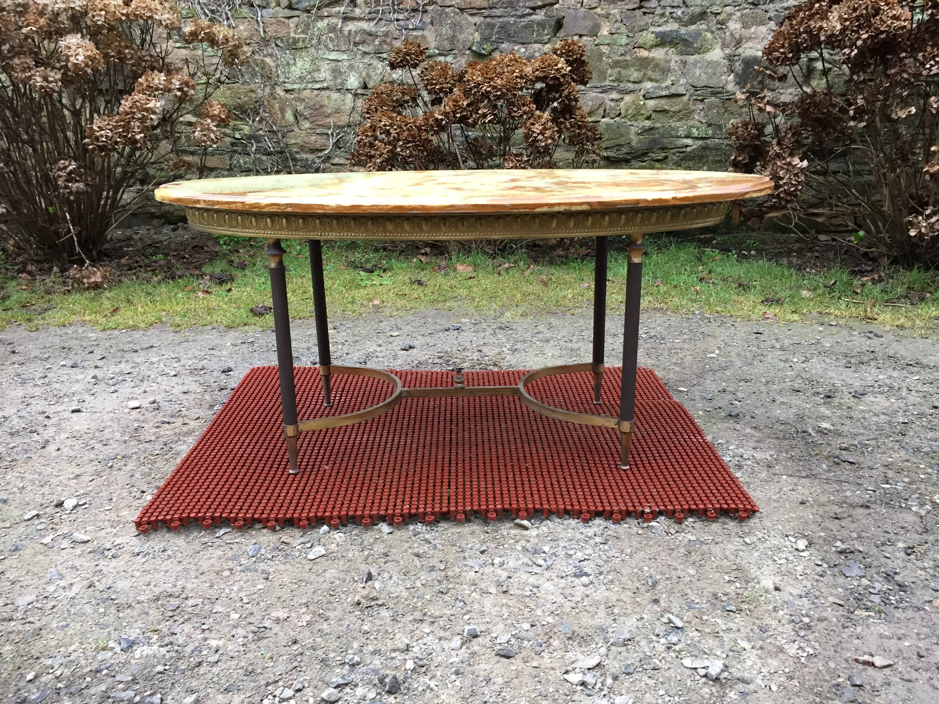 Vintage brass coffee table and oval alabaster top.