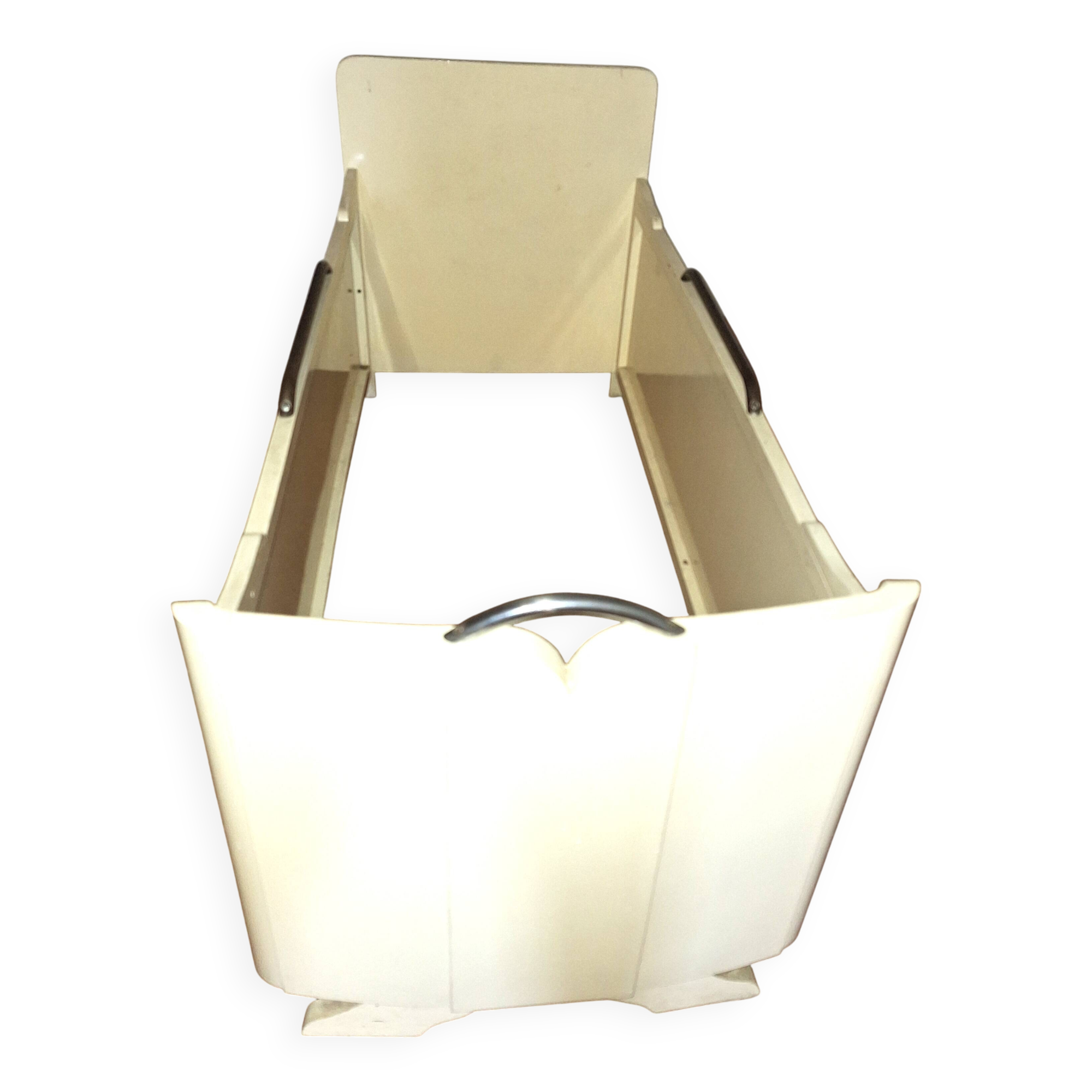 Painted wooden child's bed.