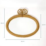 Large oval mirror in rope with pediment, 64cm x 56.5cm.