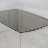Living table. chrome metal, curved smoked glass slab, france, circa 1970.