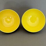 Two pitchers and three Elchinger ceramic bowls black and yellow background 1960
