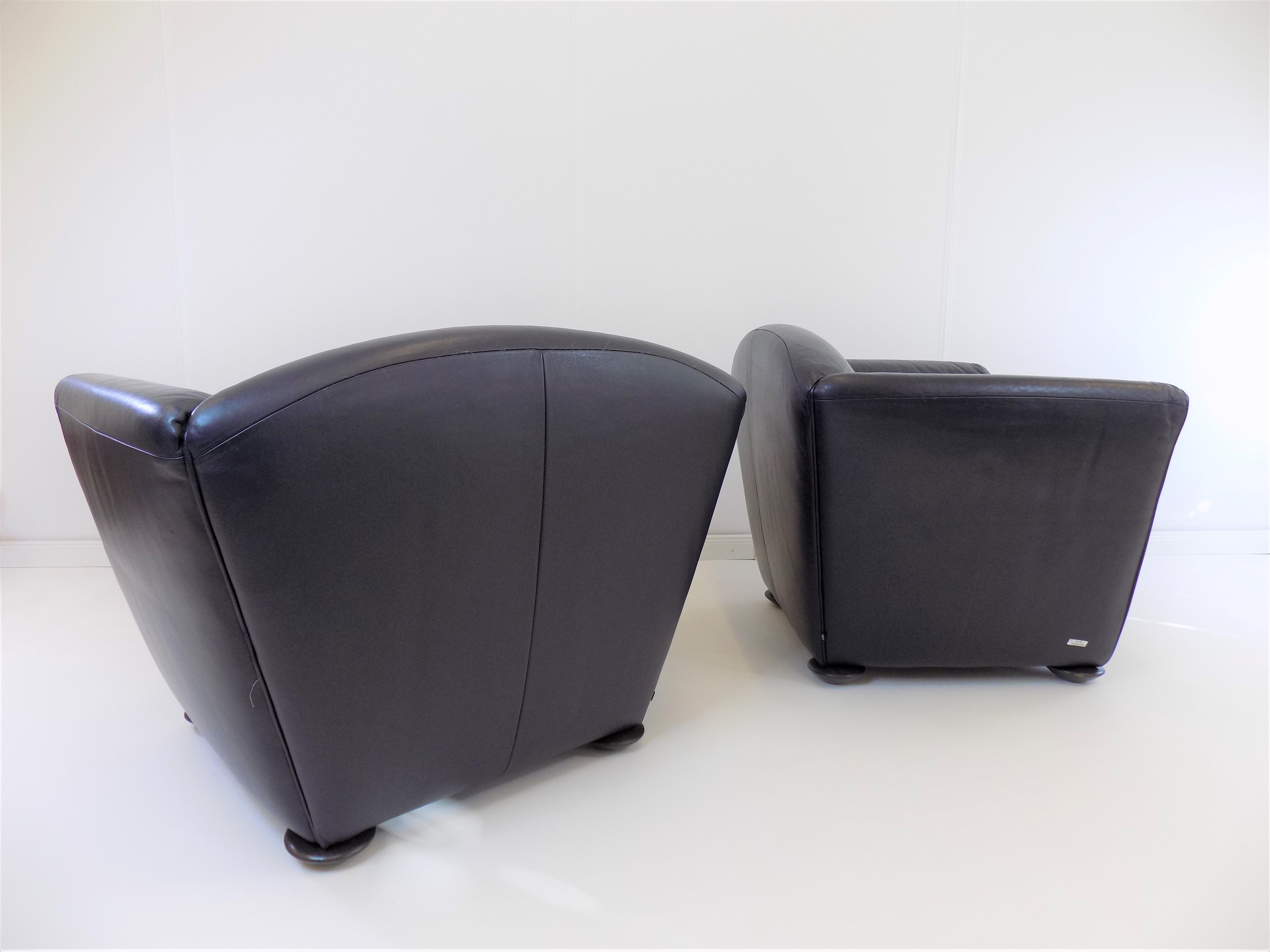 Set de 2 fauteuils en cuir par Peter Maly