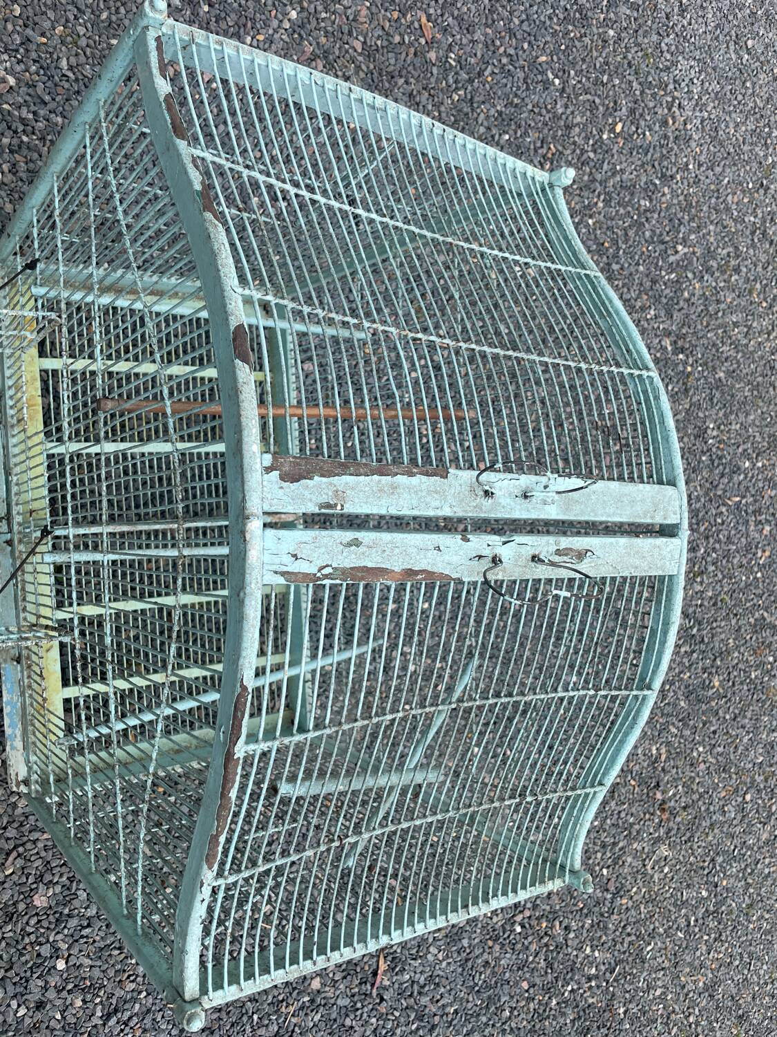 Old wooden and metal birdcage