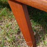 Tall chest of drawers in wood and rattan with splayed legs