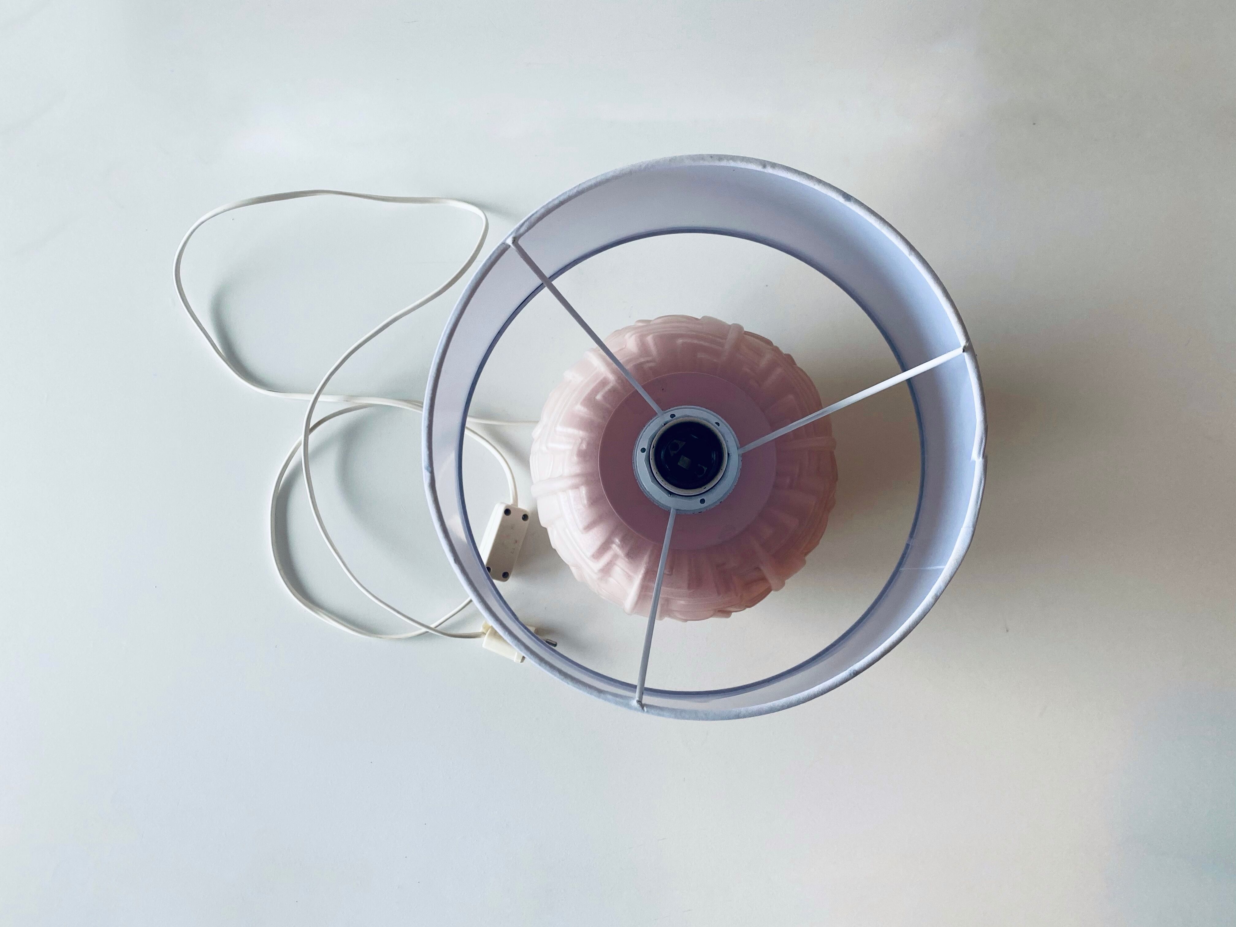 Art deco lamp in powder pink glass