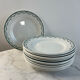 Set of 12 flat plates in Saint Amand earthenware, 22.5cm.