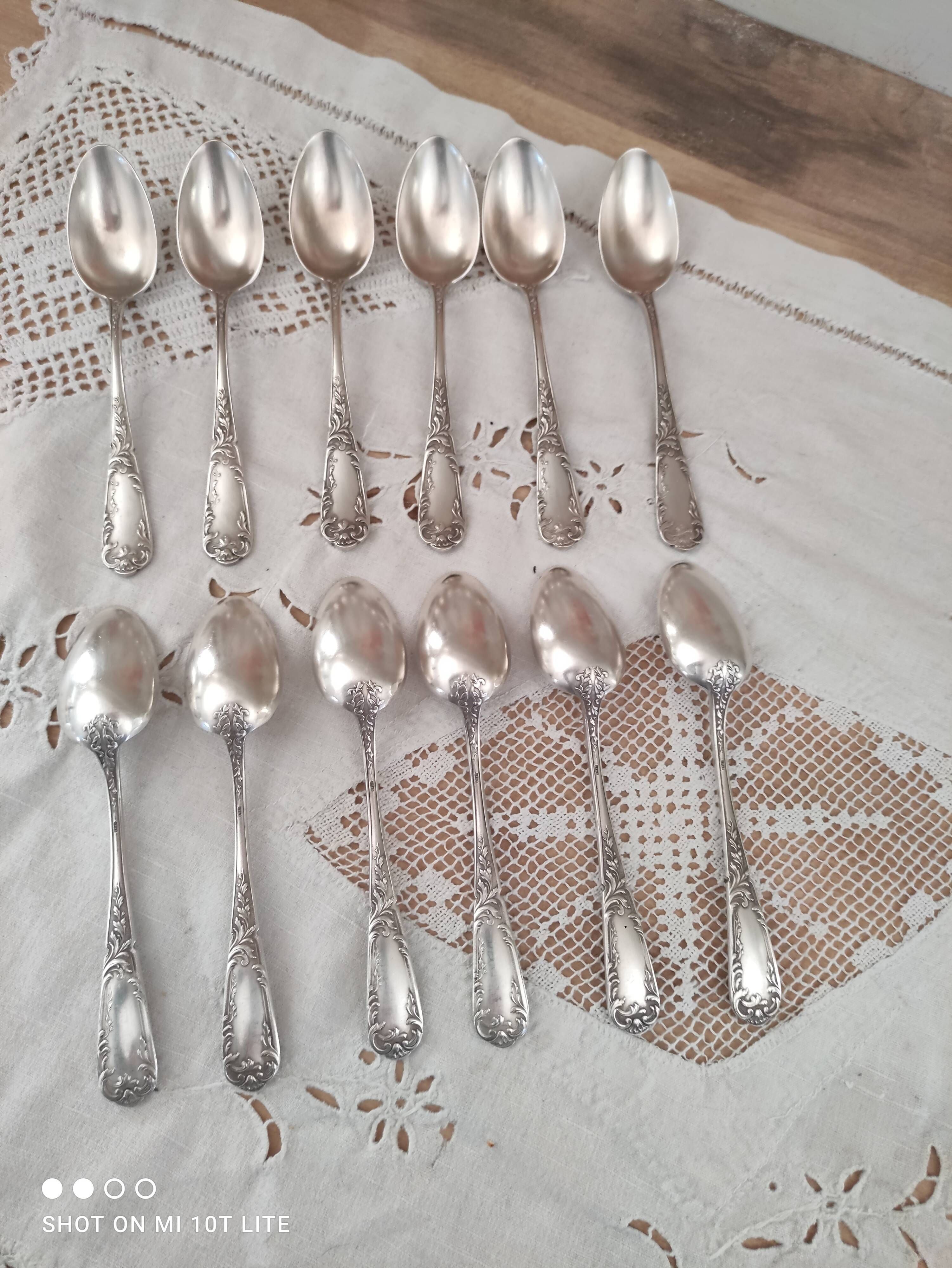 Lot of 12 small old spoons in silver metal
