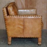 Two-seater leather canapé, hand-tanned, Edwardian style with studs.