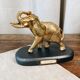 Bronze elephant on pedestal