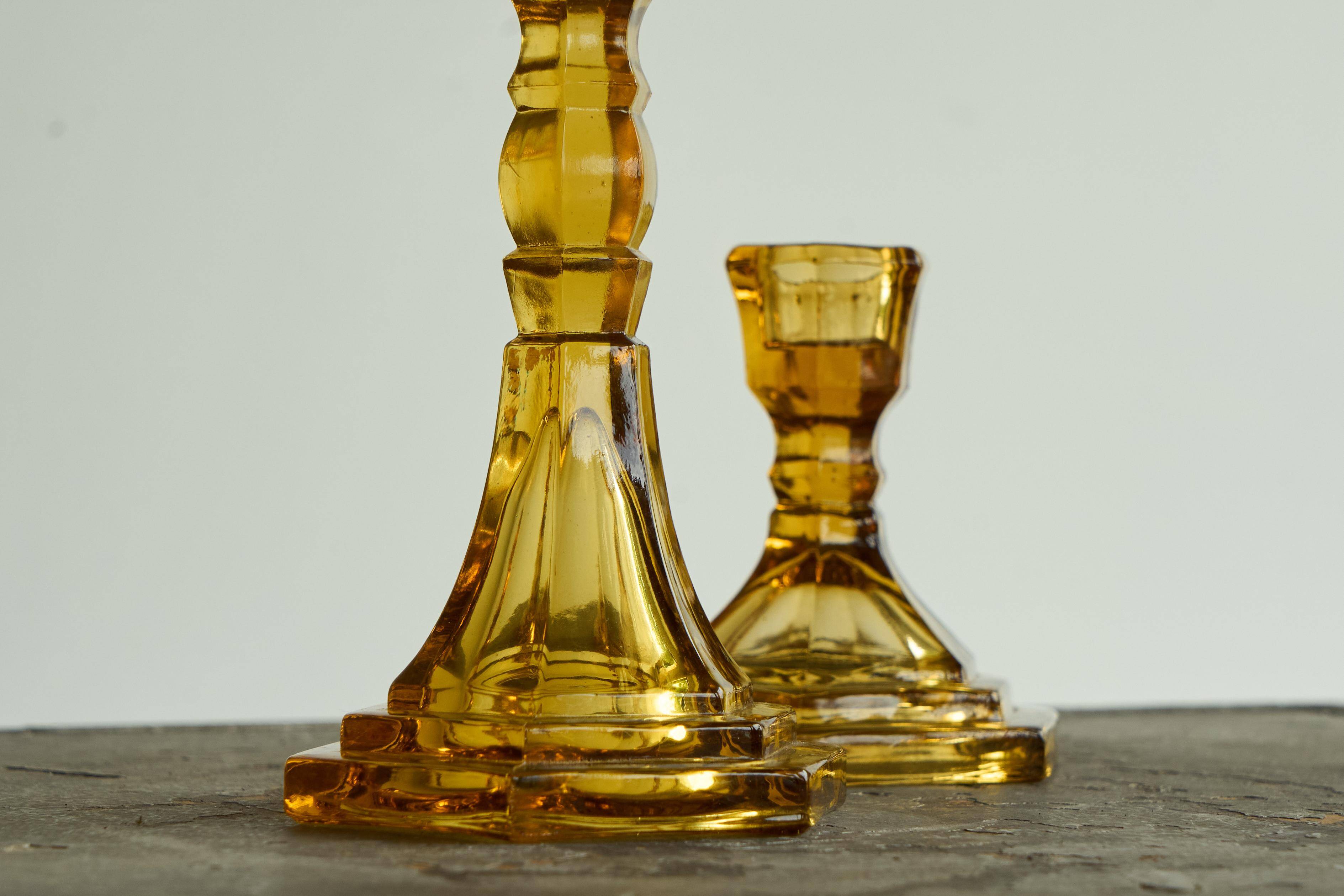 Pair of Art Deco candlesticks in pressed glass from the 1930s.