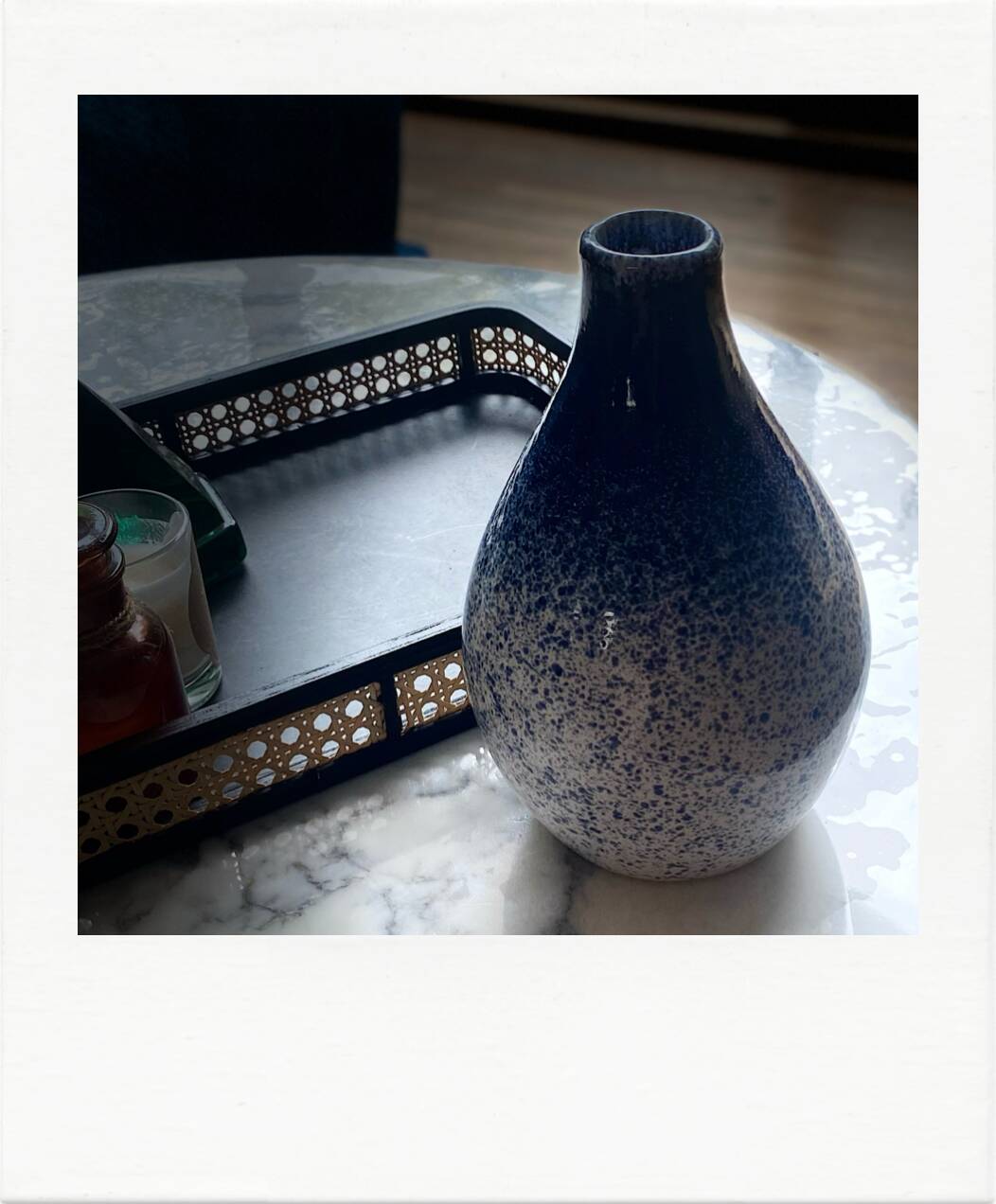 Blue and white speckled vase