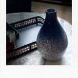 Blue and white speckled vase