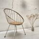 Basket armchair in metal and wood.