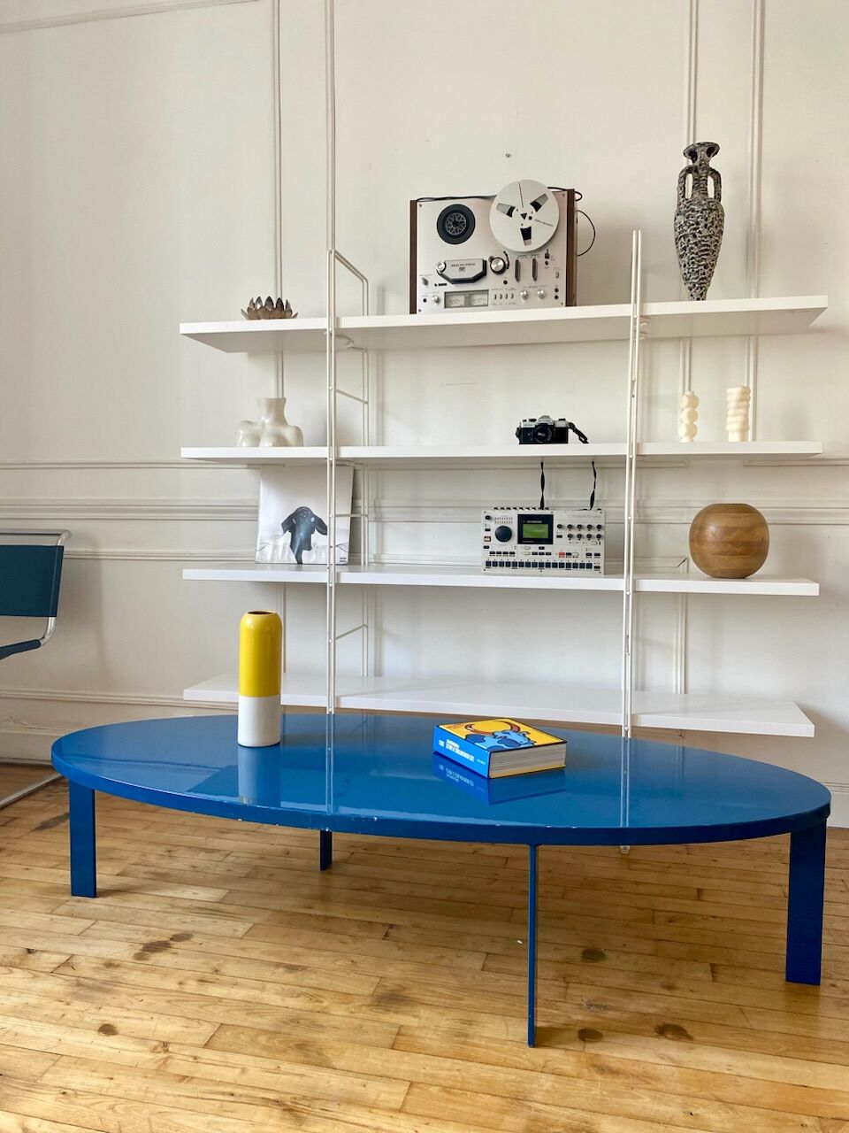 Oval coffee table in blue lacquered wood