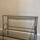 Green console and wrought iron