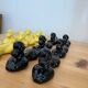 Box of 12 dog-shaped cutlery rests in yellow and black majolica.