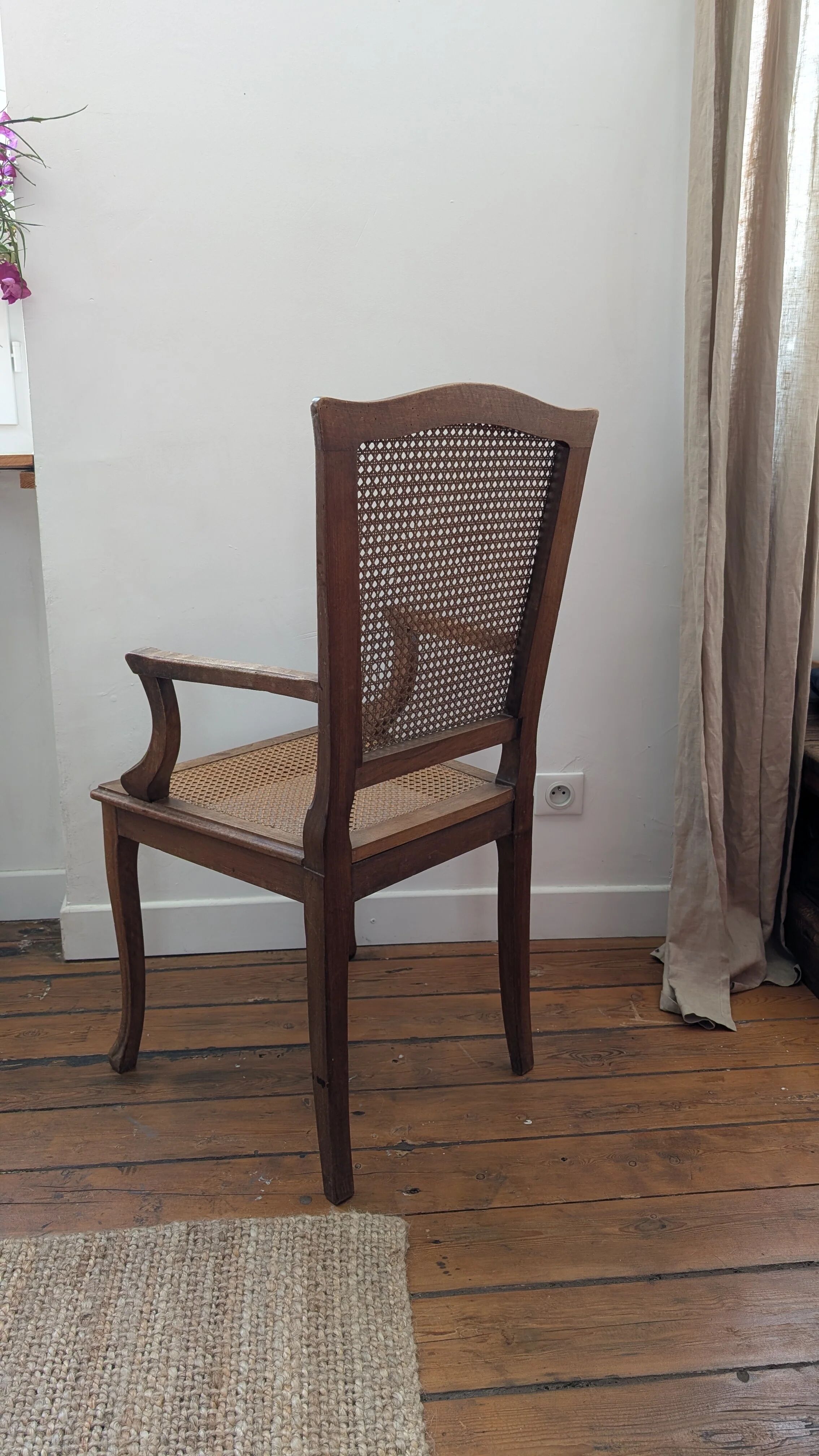 Antique Louis XVI style armchair in wood and caning