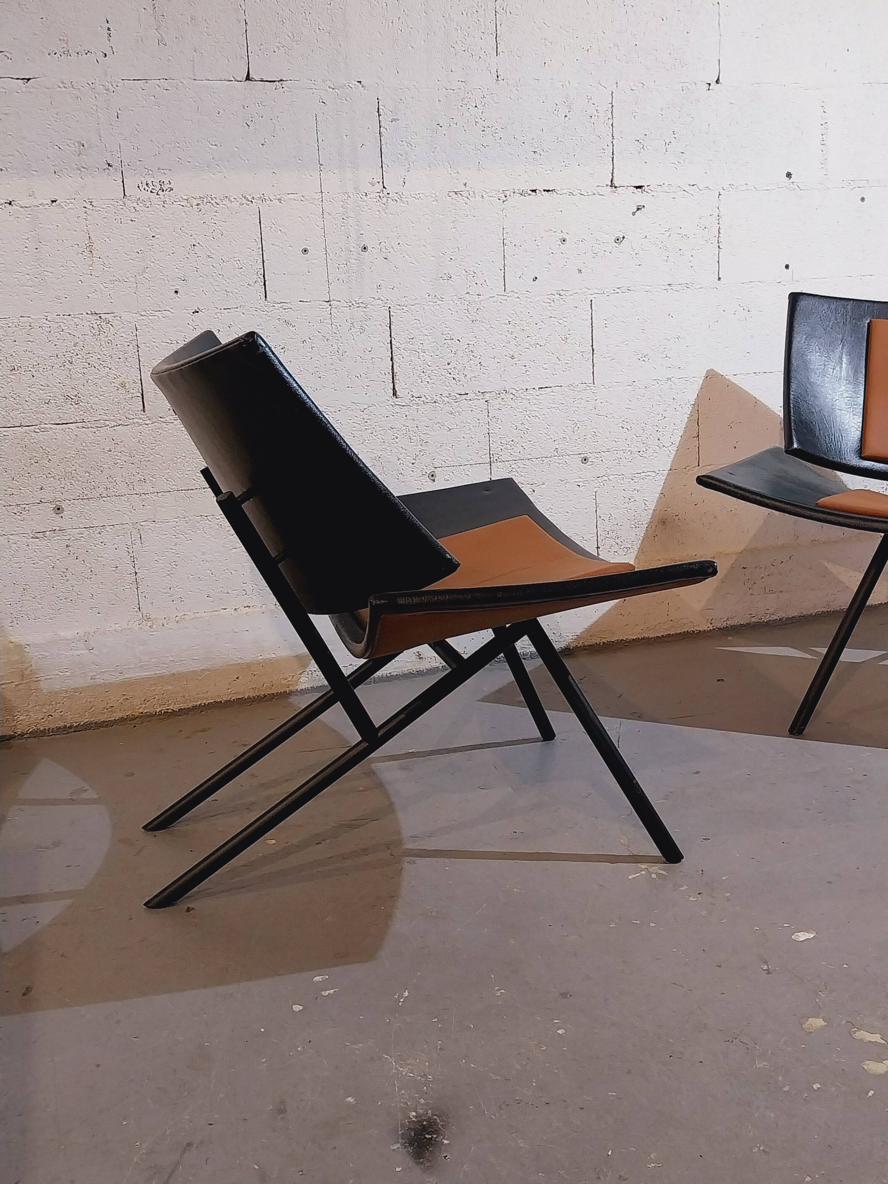 Pair of large airplane wing armchairs 1980