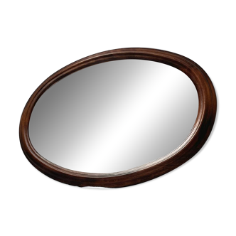 Miroir ancien ovale en bois sculpté – Teinte acajou