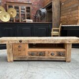 Early 20th century workbench transformed into a TV cabinet