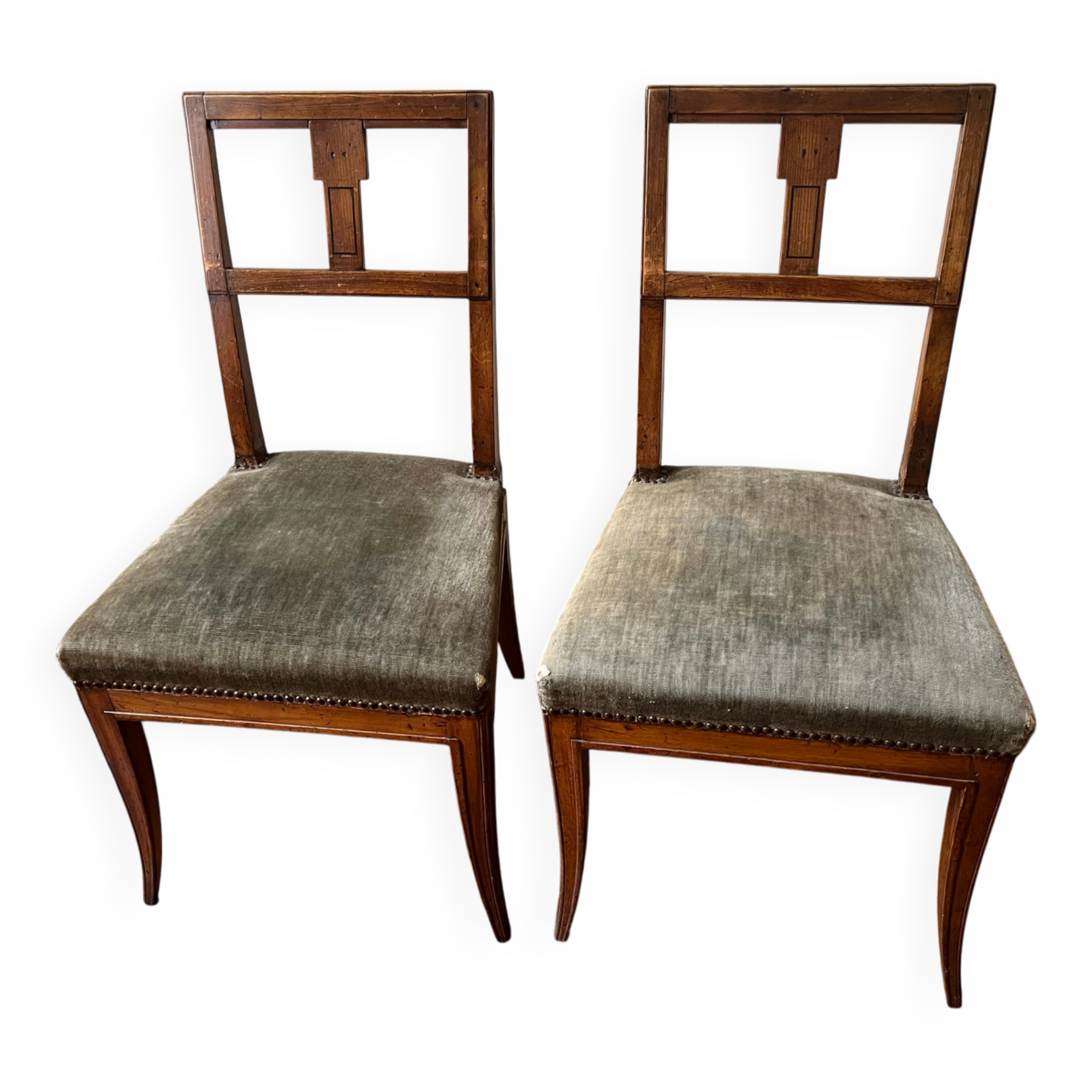 Pair of Directoire chairs in walnut, late 18th century.