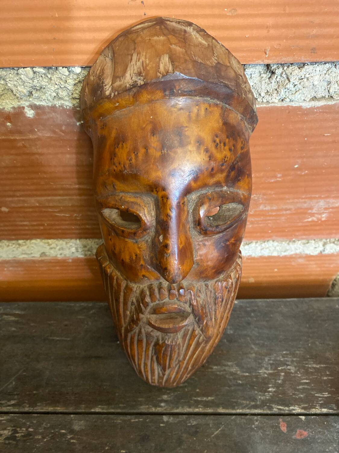 Moroccan mask in carved wood vintage decoration