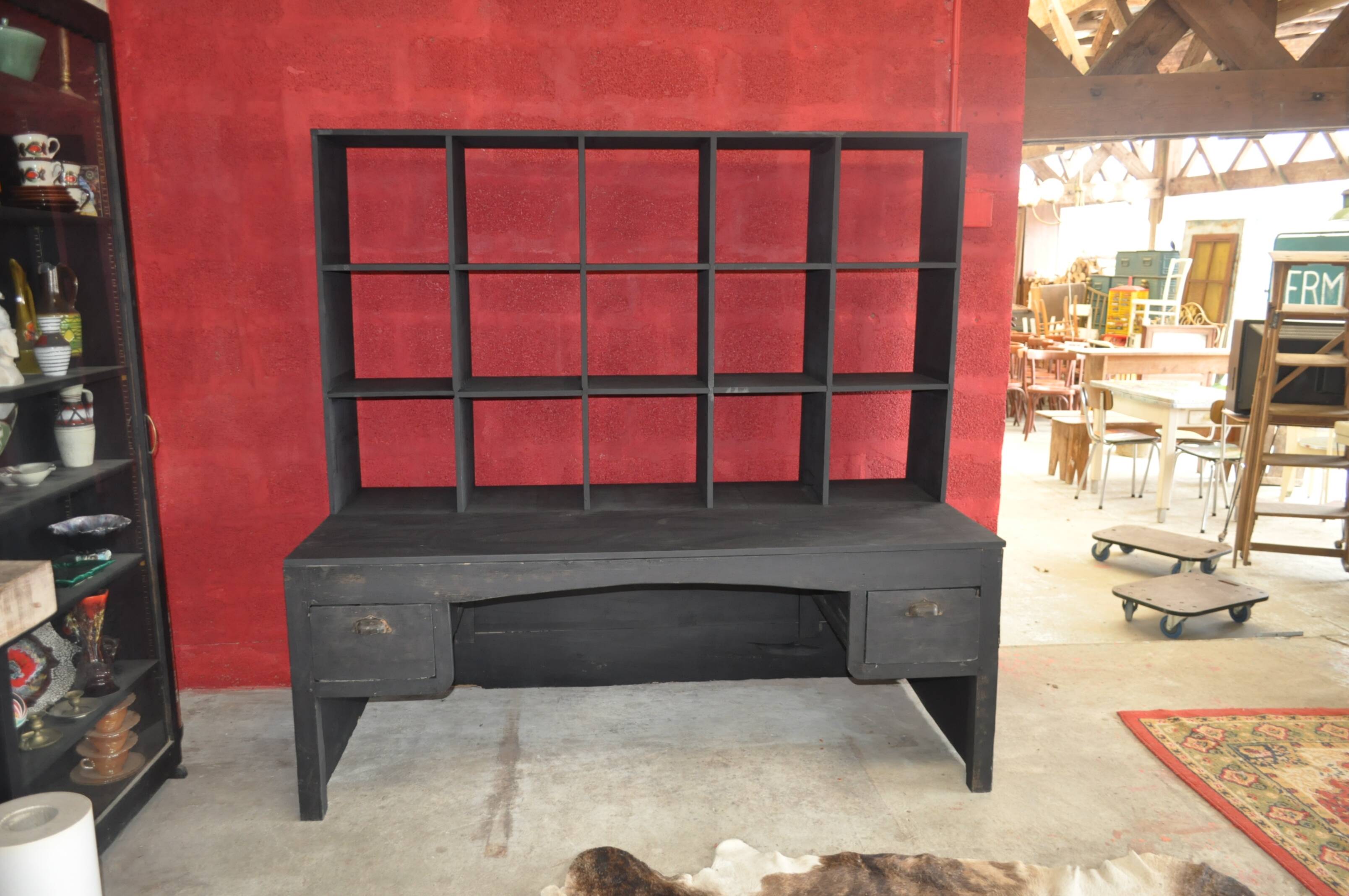 Wooden postal sorting desk.