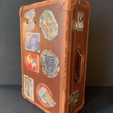 Old travel suitcase and legendary stickers, 1920